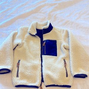 Cream sherpa jacket with navy polartec lining